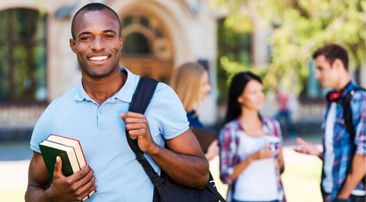 A man with a backpack and cell phone